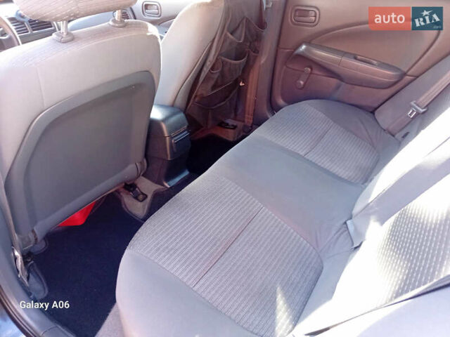 Черный Ниссан Альмера, объемом двигателя 1.6 л и пробегом 185 тыс. км за 4500 $, фото 73 на Automoto.ua