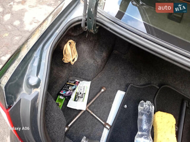 Черный Ниссан Альмера, объемом двигателя 1.6 л и пробегом 185 тыс. км за 4500 $, фото 95 на Automoto.ua