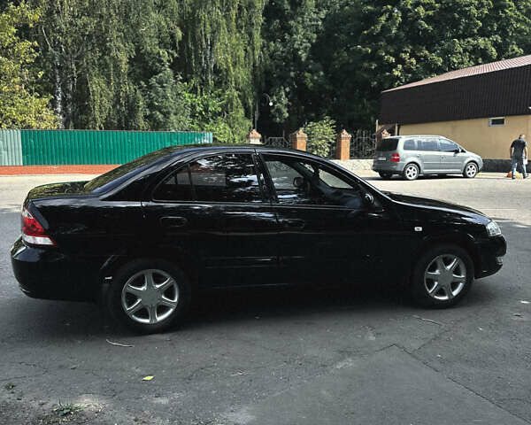 Черный Ниссан Альмера, объемом двигателя 1.6 л и пробегом 165 тыс. км за 5600 $, фото 7 на Automoto.ua