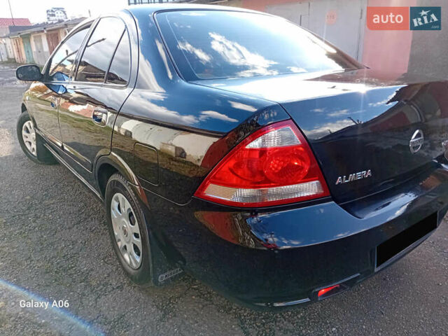 Черный Ниссан Альмера, объемом двигателя 1.6 л и пробегом 185 тыс. км за 4500 $, фото 21 на Automoto.ua