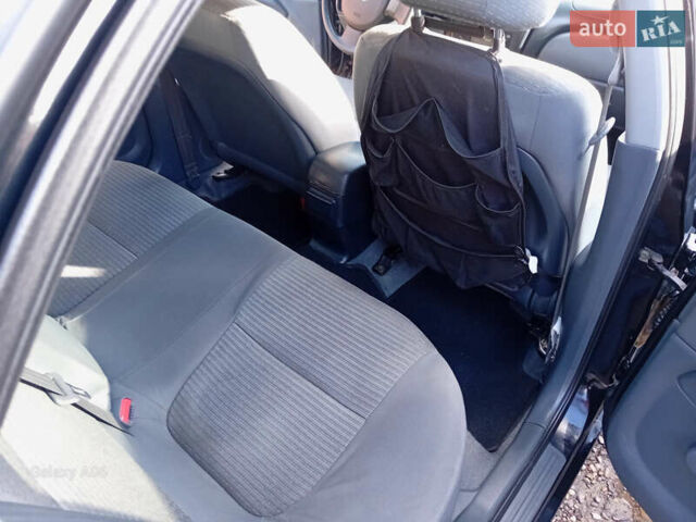 Черный Ниссан Альмера, объемом двигателя 1.6 л и пробегом 185 тыс. км за 4500 $, фото 56 на Automoto.ua