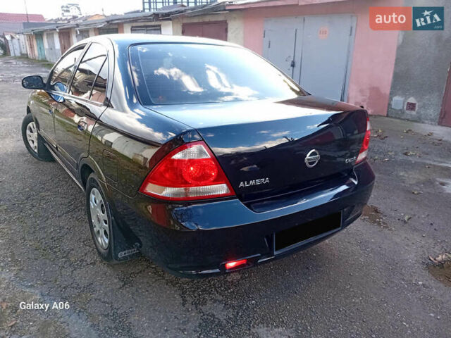 Черный Ниссан Альмера, объемом двигателя 1.6 л и пробегом 185 тыс. км за 4500 $, фото 14 на Automoto.ua