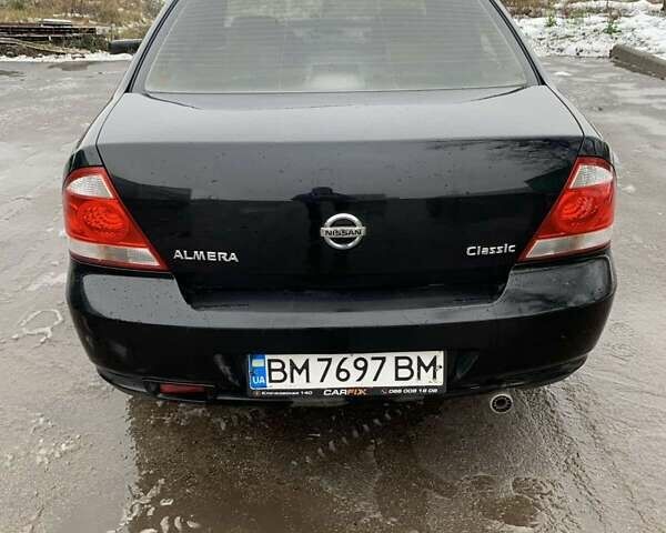 Чорний Ніссан Альмера, об'ємом двигуна 1.6 л та пробігом 300 тис. км за 2999 $, фото 3 на Automoto.ua