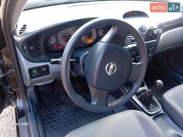 Черный Ниссан Альмера, объемом двигателя 1.6 л и пробегом 185 тыс. км за 4500 $, фото 44 на Automoto.ua