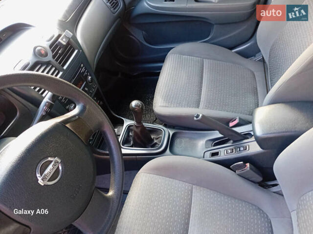 Черный Ниссан Альмера, объемом двигателя 1.6 л и пробегом 185 тыс. км за 4500 $, фото 79 на Automoto.ua