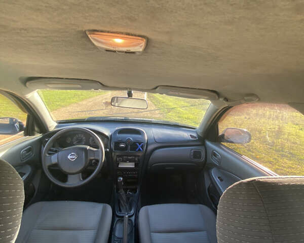 Черный Ниссан Альмера, объемом двигателя 1.6 л и пробегом 177 тыс. км за 3800 $, фото 7 на Automoto.ua