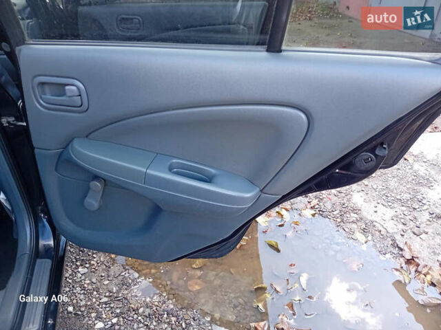 Черный Ниссан Альмера, объемом двигателя 1.6 л и пробегом 185 тыс. км за 4500 $, фото 50 на Automoto.ua