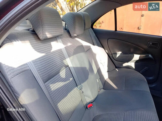 Черный Ниссан Альмера, объемом двигателя 1.6 л и пробегом 185 тыс. км за 4500 $, фото 61 на Automoto.ua