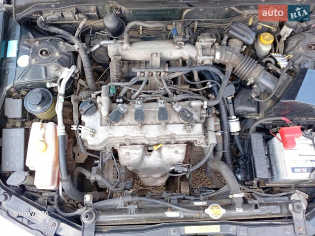 Черный Ниссан Альмера, объемом двигателя 1.6 л и пробегом 185 тыс. км за 4500 $, фото 88 на Automoto.ua