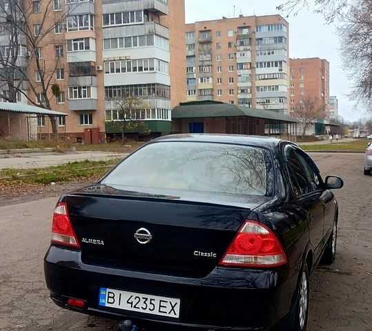 Черный Ниссан Альмера, объемом двигателя 1.6 л и пробегом 262 тыс. км за 5400 $, фото 3 на Automoto.ua