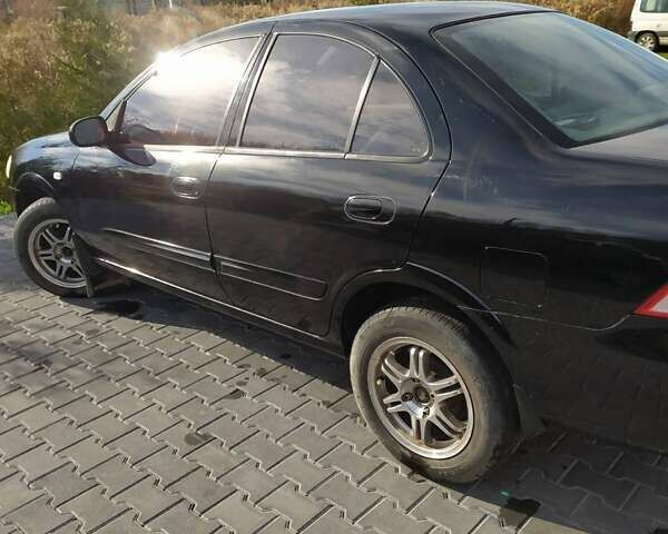 Черный Ниссан Альмера, объемом двигателя 1.6 л и пробегом 230 тыс. км за 5000 $, фото 7 на Automoto.ua