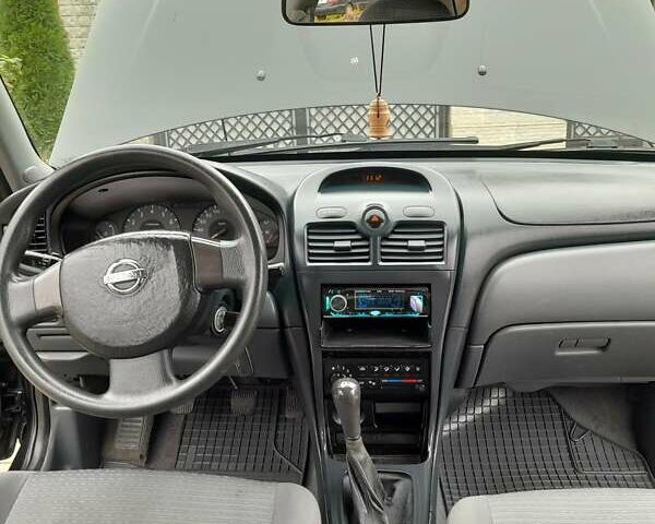 Черный Ниссан Альмера, объемом двигателя 1.6 л и пробегом 180 тыс. км за 4000 $, фото 10 на Automoto.ua