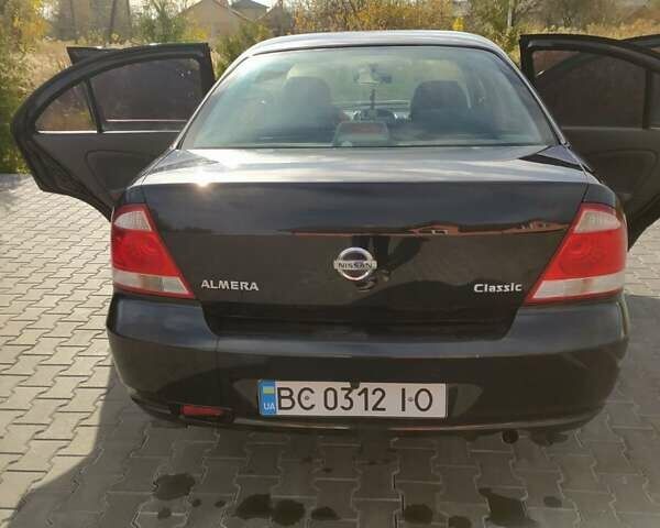 Черный Ниссан Альмера, объемом двигателя 1.6 л и пробегом 230 тыс. км за 5000 $, фото 2 на Automoto.ua