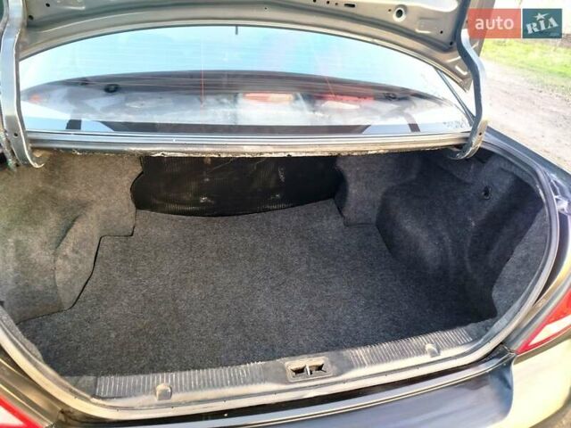 Черный Ниссан Альмера, объемом двигателя 1.6 л и пробегом 244 тыс. км за 4500 $, фото 55 на Automoto.ua