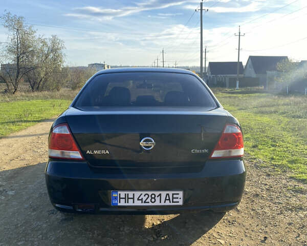 Черный Ниссан Альмера, объемом двигателя 1.6 л и пробегом 177 тыс. км за 3800 $, фото 4 на Automoto.ua