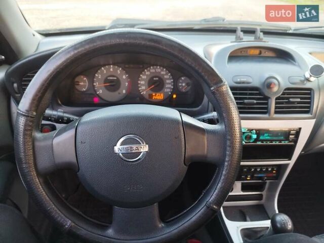 Черный Ниссан Альмера, объемом двигателя 1.6 л и пробегом 244 тыс. км за 4500 $, фото 43 на Automoto.ua