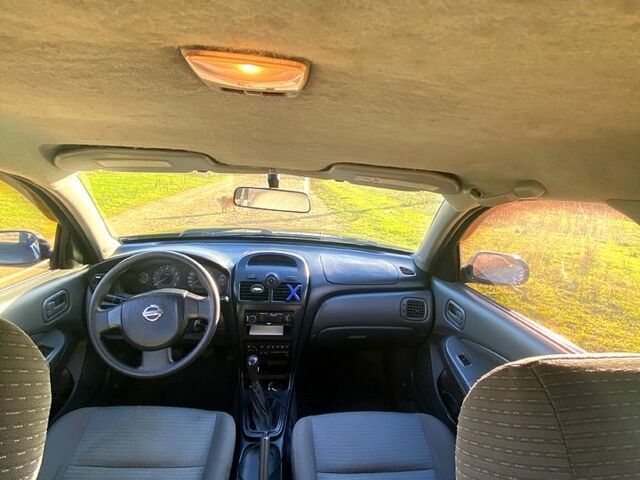 Черный Ниссан Альмера, объемом двигателя 1.6 л и пробегом 177 тыс. км за 3800 $, фото 7 на Automoto.ua