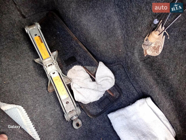 Черный Ниссан Альмера, объемом двигателя 1.6 л и пробегом 185 тыс. км за 4500 $, фото 98 на Automoto.ua