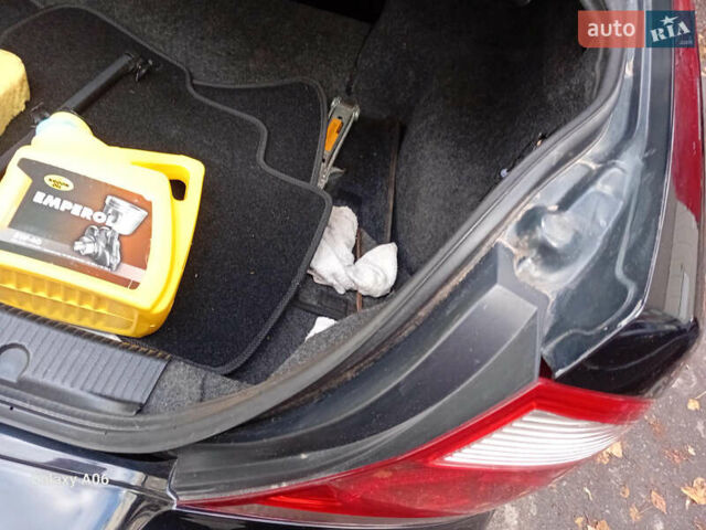 Черный Ниссан Альмера, объемом двигателя 1.6 л и пробегом 185 тыс. км за 4500 $, фото 100 на Automoto.ua