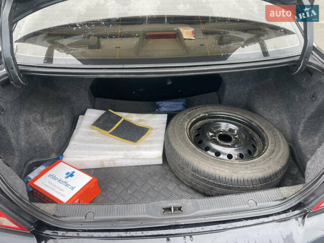 Черный Ниссан Альмера, объемом двигателя 1.6 л и пробегом 206 тыс. км за 4600 $, фото 6 на Automoto.ua