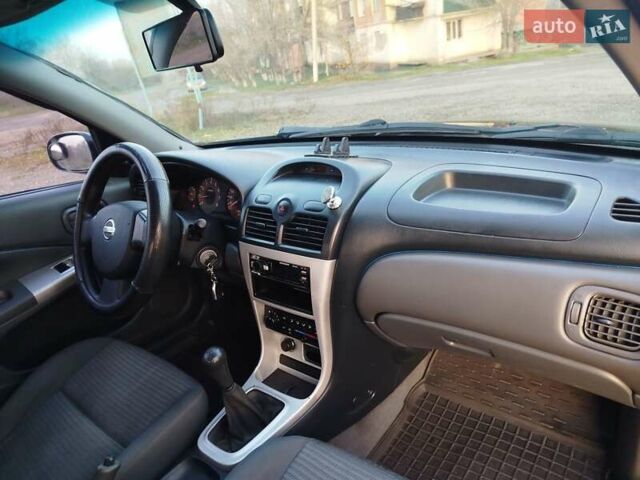 Черный Ниссан Альмера, объемом двигателя 1.6 л и пробегом 244 тыс. км за 4500 $, фото 30 на Automoto.ua