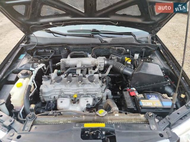 Черный Ниссан Альмера, объемом двигателя 1.6 л и пробегом 244 тыс. км за 4500 $, фото 41 на Automoto.ua