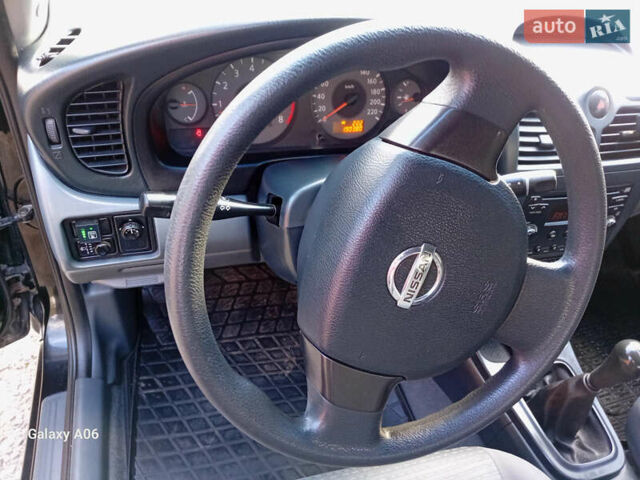 Чорний Ніссан Альмера, об'ємом двигуна 1.6 л та пробігом 185 тис. км за 4500 $, фото 45 на Automoto.ua