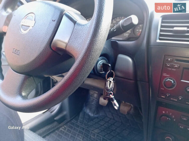 Черный Ниссан Альмера, объемом двигателя 1.6 л и пробегом 185 тыс. км за 4500 $, фото 77 на Automoto.ua