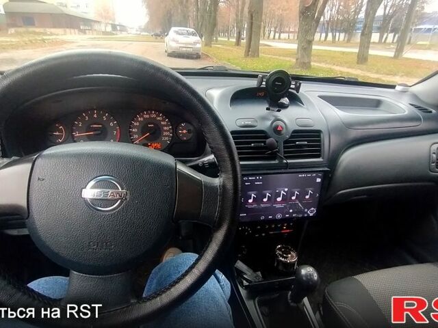 Черный Ниссан Альмера, объемом двигателя 1.6 л и пробегом 262 тыс. км за 5400 $, фото 5 на Automoto.ua