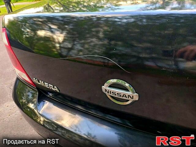 Чорний Ніссан Альмера, об'ємом двигуна 1.6 л та пробігом 300 тис. км за 3700 $, фото 2 на Automoto.ua