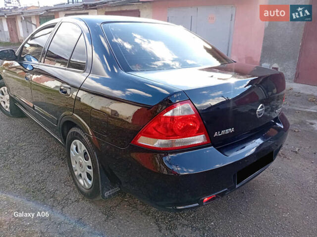 Черный Ниссан Альмера, объемом двигателя 1.6 л и пробегом 185 тыс. км за 4500 $, фото 19 на Automoto.ua