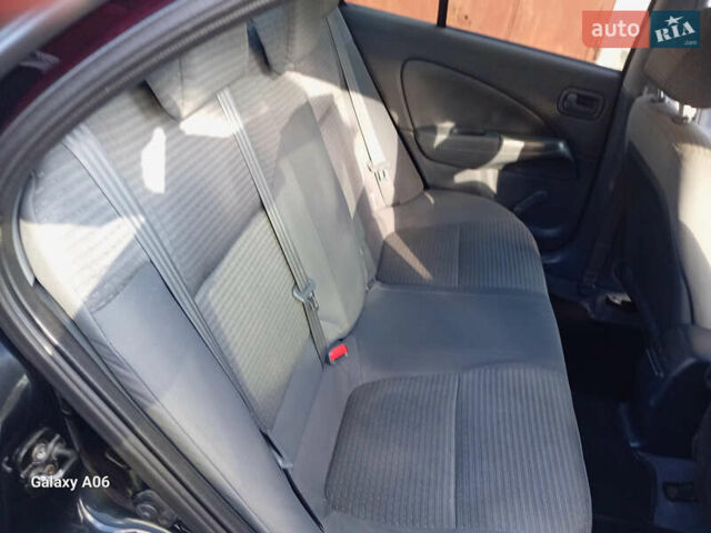 Черный Ниссан Альмера, объемом двигателя 1.6 л и пробегом 185 тыс. км за 4500 $, фото 62 на Automoto.ua