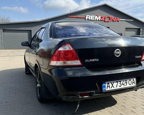 Черный Ниссан Альмера, объемом двигателя 1.6 л и пробегом 241 тыс. км за 3500 $, фото 7 на Automoto.ua