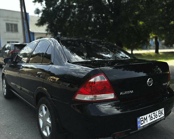 Черный Ниссан Альмера, объемом двигателя 1.6 л и пробегом 165 тыс. км за 5600 $, фото 3 на Automoto.ua
