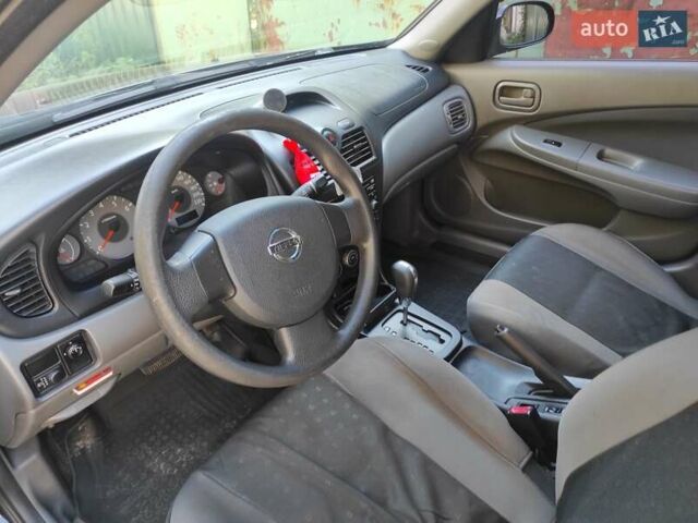 Черный Ниссан Альмера, объемом двигателя 1.6 л и пробегом 225 тыс. км за 5200 $, фото 8 на Automoto.ua