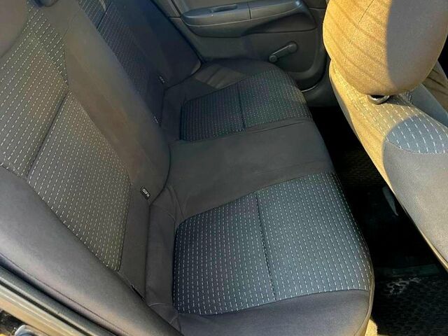 Черный Ниссан Альмера, объемом двигателя 1.6 л и пробегом 300 тыс. км за 4250 $, фото 5 на Automoto.ua