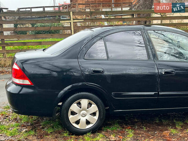 Чорний Ніссан Альмера, об'ємом двигуна 1.6 л та пробігом 203 тис. км за 5990 $, фото 13 на Automoto.ua