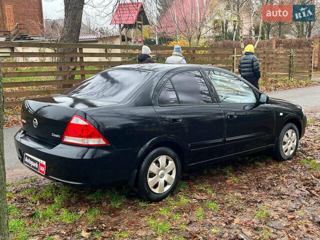 Чорний Ніссан Альмера, об'ємом двигуна 1.6 л та пробігом 203 тис. км за 5990 $, фото 12 на Automoto.ua