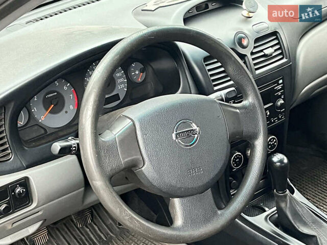 Чорний Ніссан Альмера, об'ємом двигуна 1.6 л та пробігом 203 тис. км за 5990 $, фото 30 на Automoto.ua