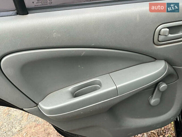 Чорний Ніссан Альмера, об'ємом двигуна 1.6 л та пробігом 203 тис. км за 5990 $, фото 26 на Automoto.ua