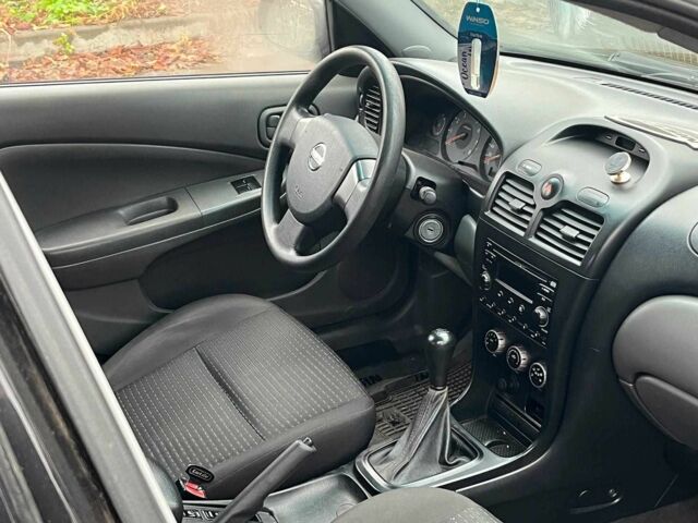 Черный Ниссан Альмера, объемом двигателя 1.6 л и пробегом 203 тыс. км за 5990 $, фото 18 на Automoto.ua