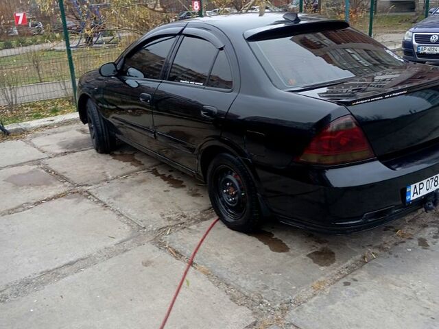 Чорний Ніссан Альмера, об'ємом двигуна 1.6 л та пробігом 300 тис. км за 4200 $, фото 3 на Automoto.ua