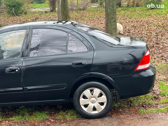 Черный Ниссан Альмера, объемом двигателя 1.6 л и пробегом 203 тыс. км за 5990 $, фото 6 на Automoto.ua