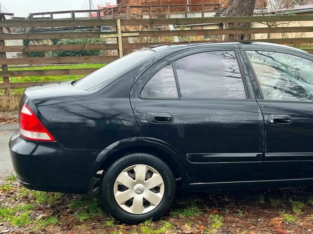 Черный Ниссан Альмера, объемом двигателя 1.6 л и пробегом 203 тыс. км за 5990 $, фото 13 на Automoto.ua