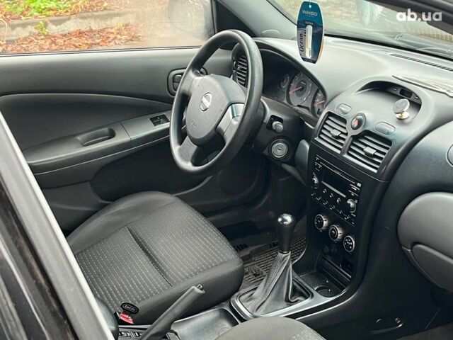 Черный Ниссан Альмера, объемом двигателя 1.6 л и пробегом 203 тыс. км за 5990 $, фото 18 на Automoto.ua