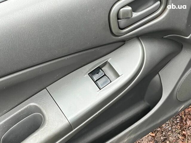 Черный Ниссан Альмера, объемом двигателя 1.6 л и пробегом 203 тыс. км за 5990 $, фото 28 на Automoto.ua