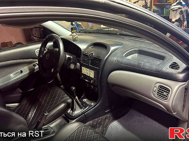 Чорний Ніссан Альмера, об'ємом двигуна 1.6 л та пробігом 197 тис. км за 3750 $, фото 2 на Automoto.ua