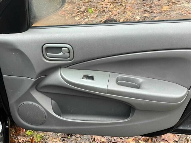 Черный Ниссан Альмера, объемом двигателя 1.6 л и пробегом 203 тыс. км за 5990 $, фото 15 на Automoto.ua