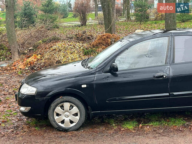 Чорний Ніссан Альмера, об'ємом двигуна 1.6 л та пробігом 203 тис. км за 5990 $, фото 5 на Automoto.ua