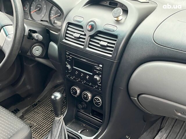 Черный Ниссан Альмера, объемом двигателя 1.6 л и пробегом 203 тыс. км за 5990 $, фото 19 на Automoto.ua